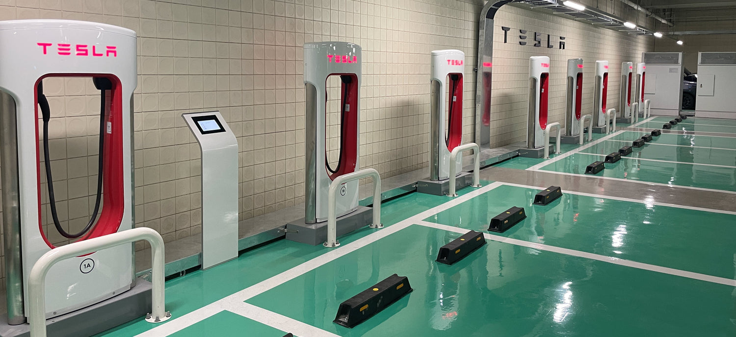 Armodilo Alur kiosk at a Tesla charging station in Taiwan, offering a secondary payment solution to comply with government regulations.