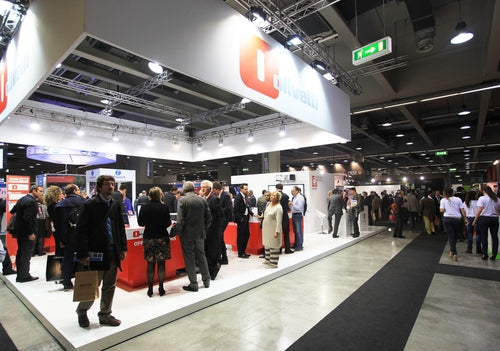 Tablet & iPad enclosures displaying among people at a tradeshow