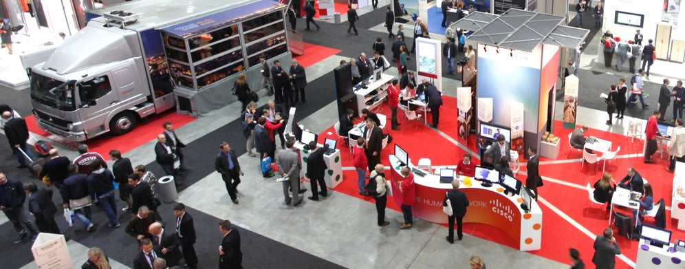 Tradeshow with enclosures and tablet stands